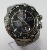 Seiko, a gents stainless steel solar chronograph with box and purchase receipt dated 2015 and