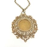A full gold sovereign pendant chain set with Victoria 1891 sovereign within an ornate and pierced