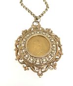 A full gold sovereign pendant chain set with Victoria 1891 sovereign within an ornate and pierced