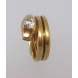 A yellow gold and diamond set snake ring, finger size O.