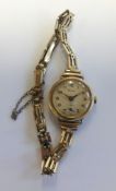 A Pioneer vintage ladies 9ct gold bracelet wristwatch, weight 15.2gms.