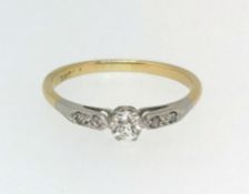 An 18ct and diamond set ring.