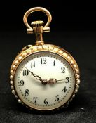 A 14ct pearl Loys miniature pocket watch, the back plate stamped '30300', arabic dial, fusee