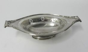 A silver and pierced bon bon dish with acanthus scroll handles, marked Dupree and Young Ltd, Exeter,