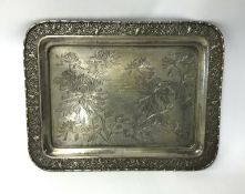 Chinese Export Silver, a presentation tray of rectangular form, the border decorated with birds and