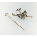 An antique bar brooch with gem set butterfly, together with a pearl stock pin.