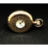 A 9ct gold half hunter keyless pocket watch, with plain back plate, the dial with roman numerals and