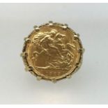 A gold half sovereign ring, set with a Victoria 1899 half sovereign in a 9ct decorative shank, total