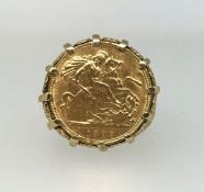 A gold half sovereign ring, set with a Victoria 1899 half sovereign in a 9ct decorative shank, total