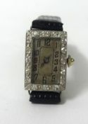 A platinum and 18ct ladies vintage cocktail watch with diamond border, the mechanical movement