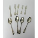 A quantity of mainly Geo III silver flatware mostly spoons and forks also a pair of silver table