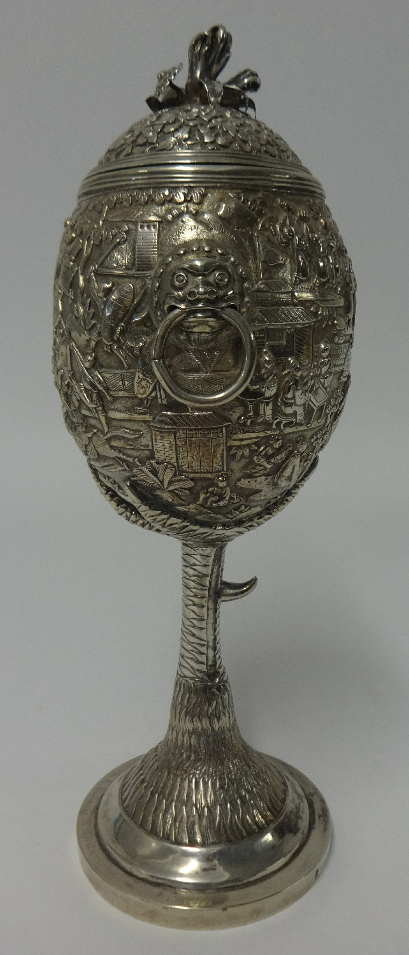 Chinese Export Silver, a Challenge Cup, richly embossed decorated with various scenes including - Image 5 of 10