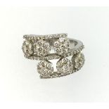 An impressive 18ct white gold double band diamond cluster ring, stamped .750, finger size M/N.