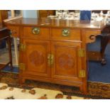 A 20th Century Chinese rosewood 'Alter' style cupboard.