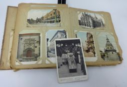 An early 20th Century postcard album, various family naval documents W.J Tooley, Stoker, Devonport