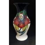 Moorcroft, a baluster shaped vase, 'Anna Lily' No.226/7 circa 1998, height 20cm, boxed.