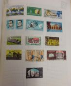 A collection of world stamps in several albums (approx 10).