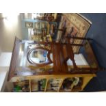 A mahogany hallstand with horseshoe style mirror