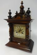 Victorian stained wood mantel clock with eight day chiming movement, height 48cm.