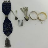 A silver gilt bangle, evening purse, silver bangle, sundry spoons and vesta.