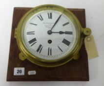 A ships clock, the dial marked 'Chatteau Freres, Collin Wagner, Paris', diameter 18cm mounted on a