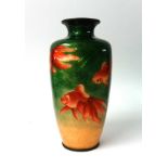 A Japanese cloisonne vase: of ovoid tapering form, decorated all over with carp, 32cm. high.