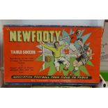 A table soccer game and a collection of various boxed diecast promo models including Matchbox.