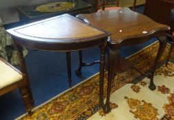 An early 20th century mahogany occasional table with lower tier and carved legs with claw & ball