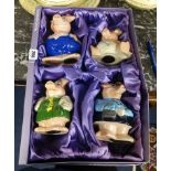 Four Nat West Wade piggy banks