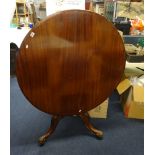A Victorian mahogany circular breakfast table with tip up top, diameter 102cm, together with three