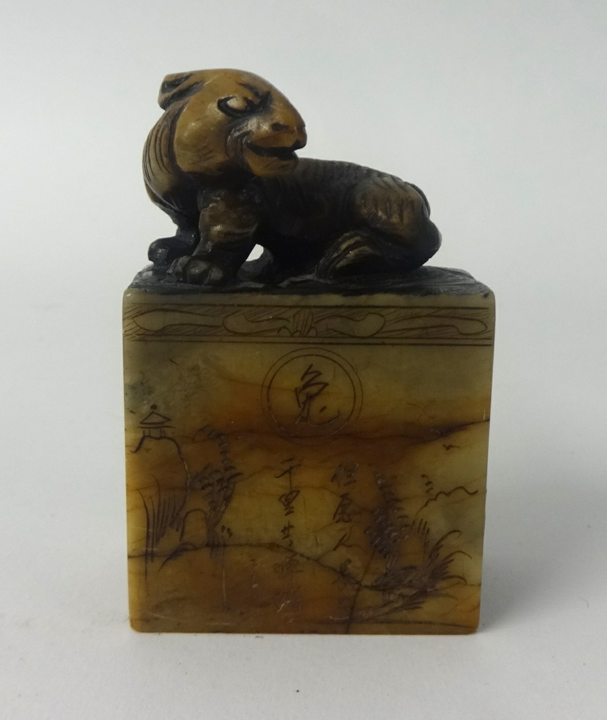 A carved Oriental soapstone? Seal, height 8cm x width 5cm