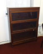 A pair of modern three section bookcases (2)