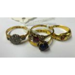 Four antique gold dress rings including 9ct gold spinel ring, 22ct gold sapphire set ring, 18ct gold