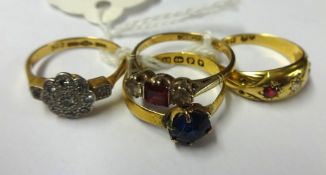 Four antique gold dress rings including 9ct gold spinel ring, 22ct gold sapphire set ring, 18ct gold