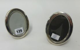 Concorde, a pair of small silver oval photo frames 11cm x 8.5cm.