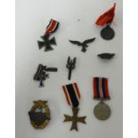 Various medals including German Mothers Cross, Iron Cross, other German badges and cap badges (9).