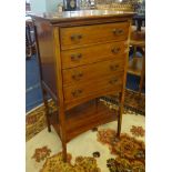 Edwardian mahogany and inlaid four drawer music cabinet.