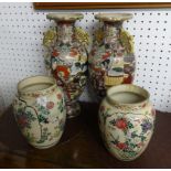 Two pairs of Japanese earthenware vases