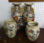 Two pairs of Japanese earthenware vases