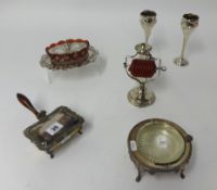 Silver plated wares, a ruby glass and plated jam dish, an unusual wax candle stand, a muffin