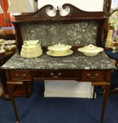 A mahogany and marble top washstand