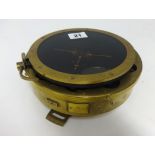 A brass cased Naval Ship's compass marked 6B/1671.