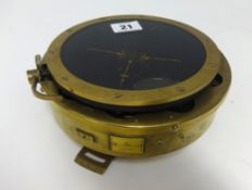 A brass cased Naval Ship's compass marked 6B/1671.