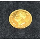 A 1882 gold shield back 'Umberto I', 20 lira.