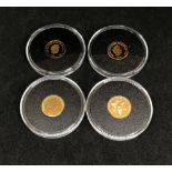 Jubilee Mint, four QEII commemorative coins including centenary of WWI in 9ct gold.