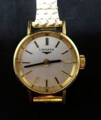Longines, an 18ct gold ladies Swiss made 1965 wristwatch.