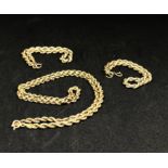 A 9ct gold necklace and two smaller similar bracelets, approx 10gms.