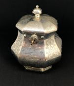 An early Victorian octangular chased gothic design silver tea caddy, with lock and key by Charles