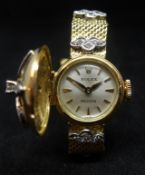 Rolex, a fine ladies vintage 18ct gold cocktail watch, the dial with hinged cover set with diamonds,