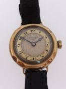J.W Benson, London, a vintage ladies 9ct gold mechanical wristwatch.